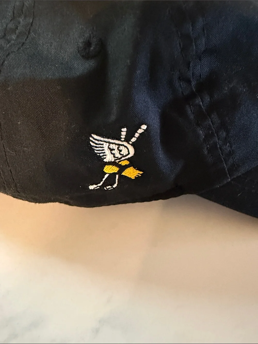 Black Skull & Crossbones Winged Foot Logo Golf Cap